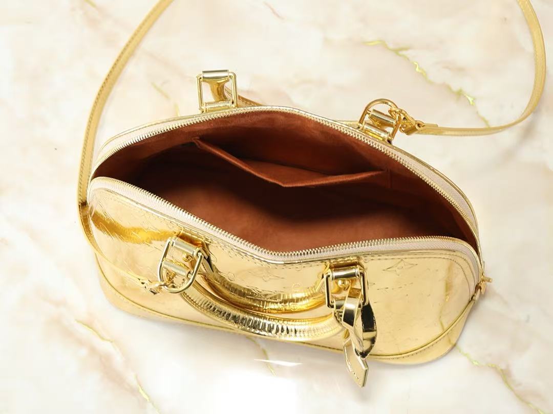 Louis Vuitton ALMA 32