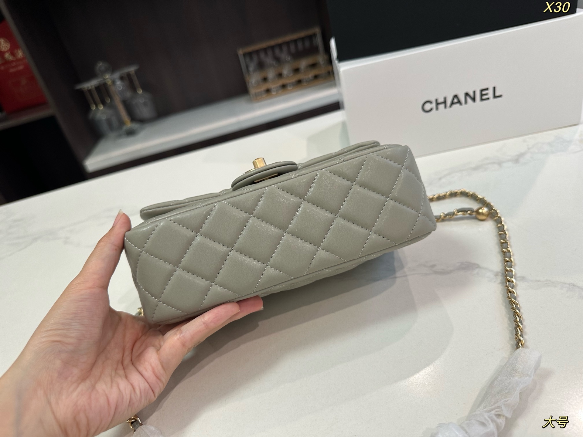 Chanel Classic Flap Bag with Gold Ball