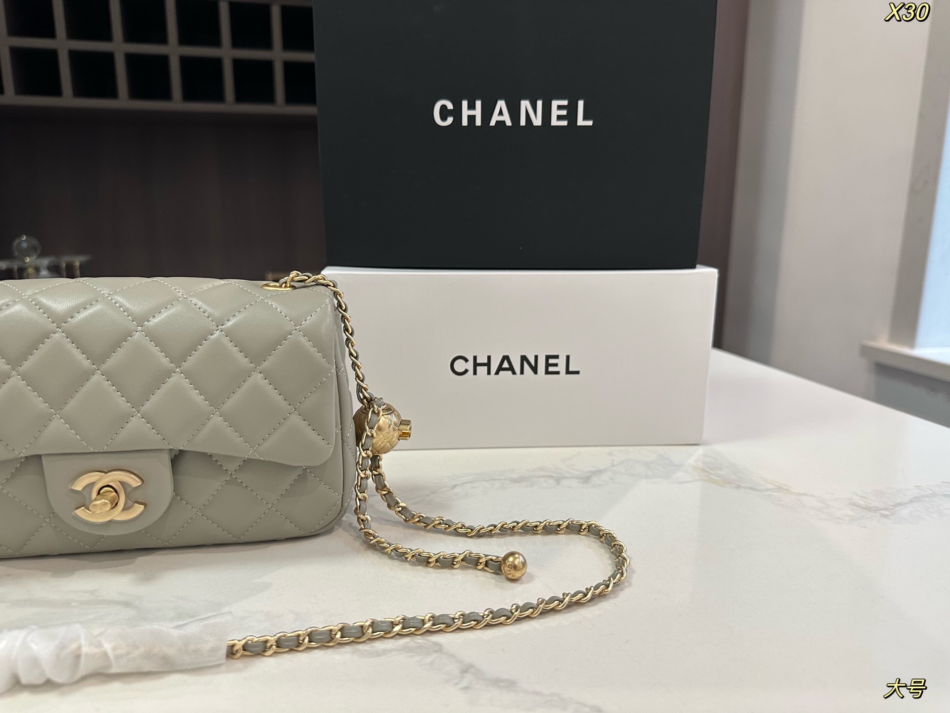 Chanel Classic Flap Bag with Gold Ball