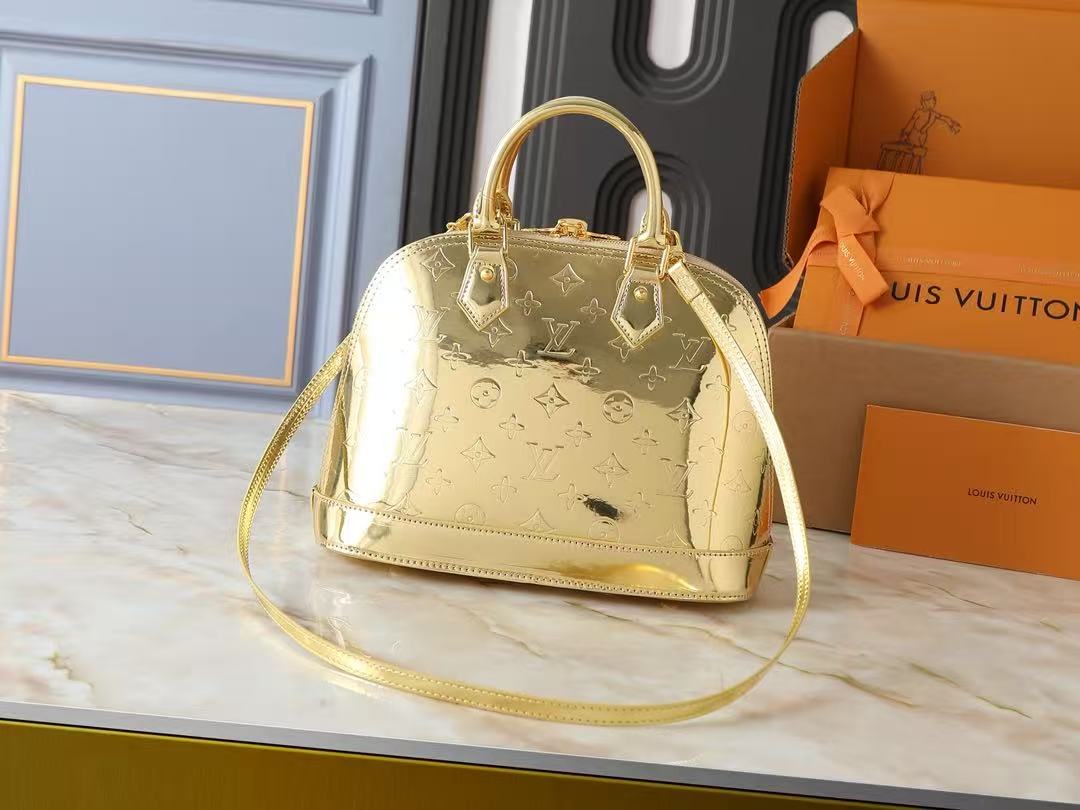 Louis Vuitton ALMA 32
