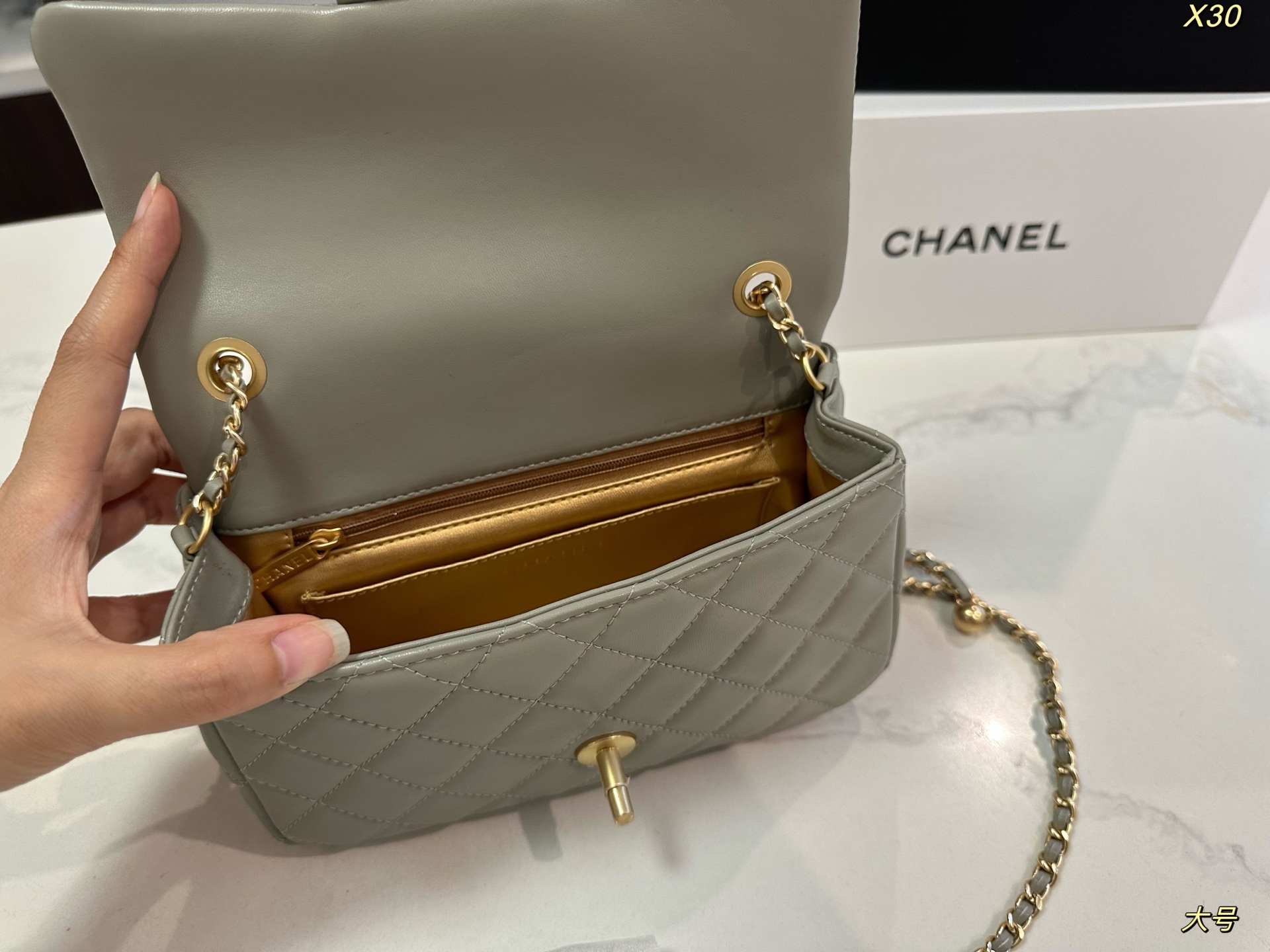 Chanel Classic Flap Bag with Gold Ball