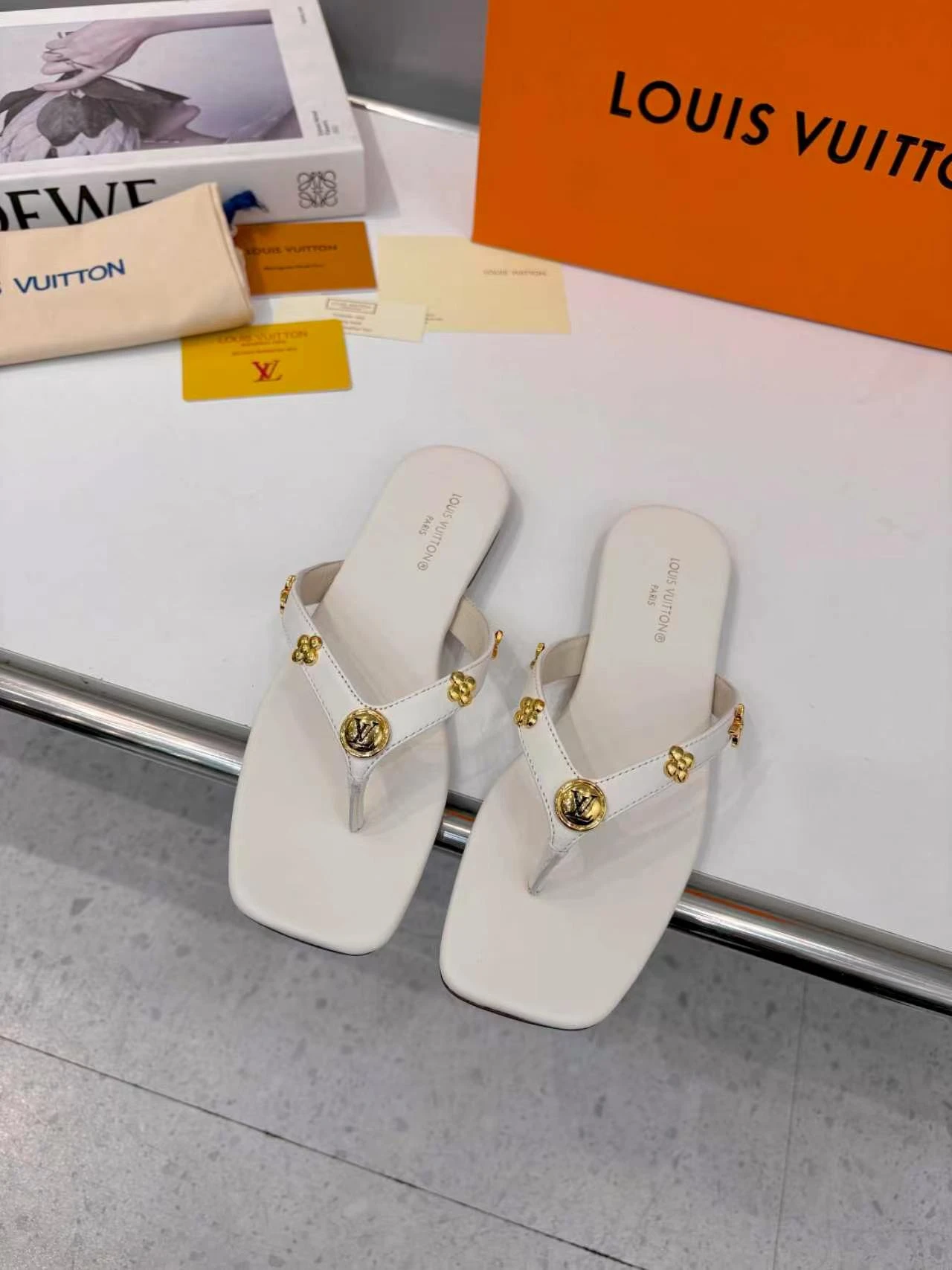 LV rivet flip flops