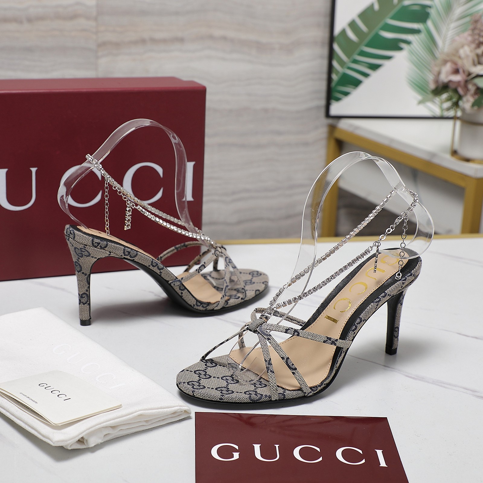 Gucci Stiletto heel sandals with crystal chain