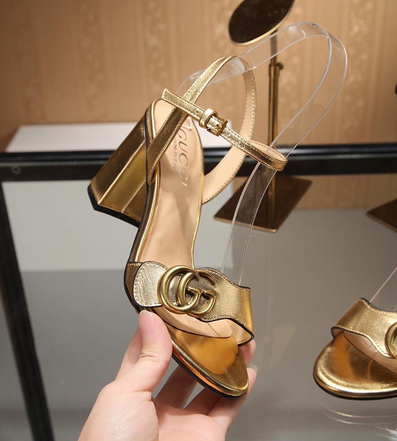 Gucci Bronze-colored buckle sandals