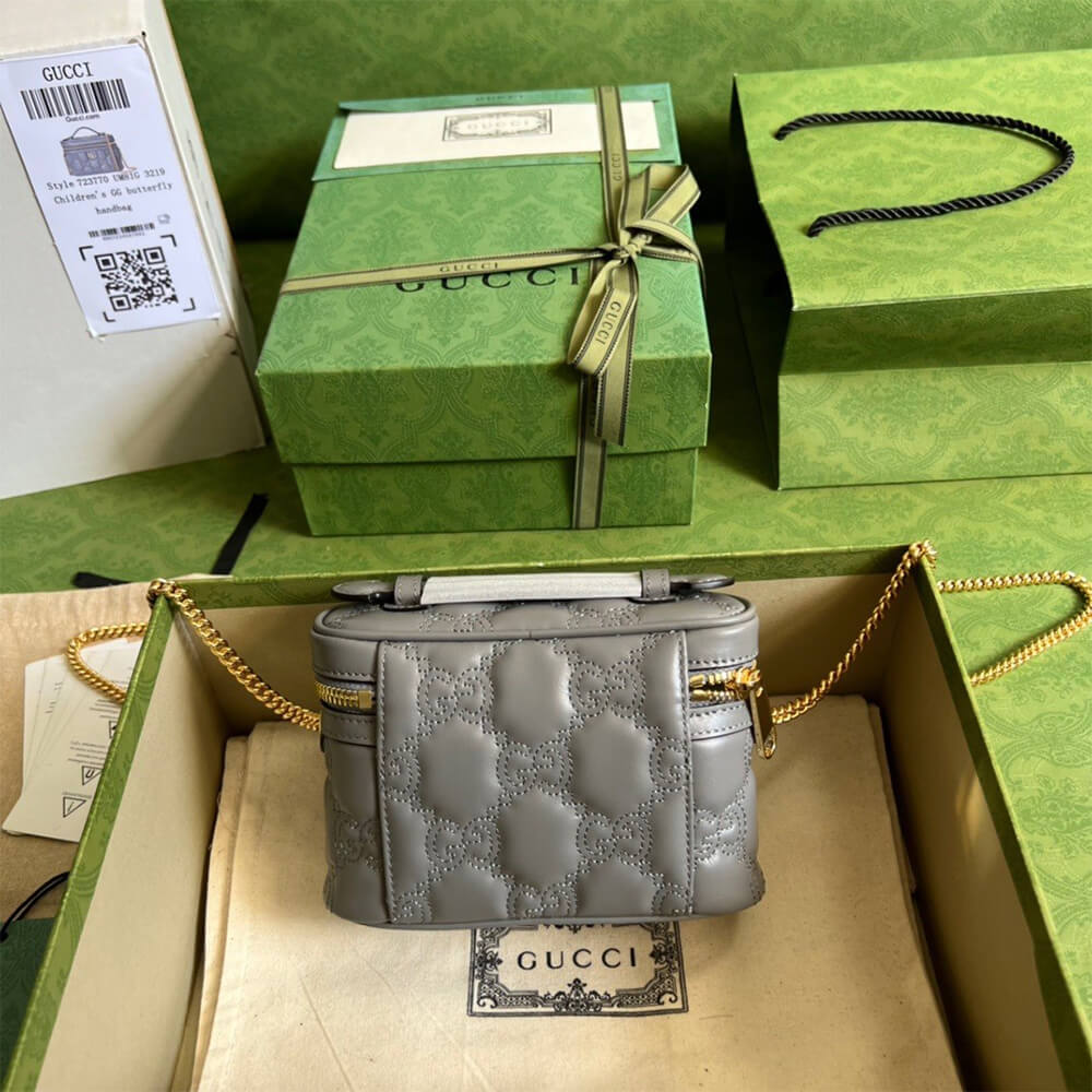 GG Matelass&eacute; top handle mini bag
