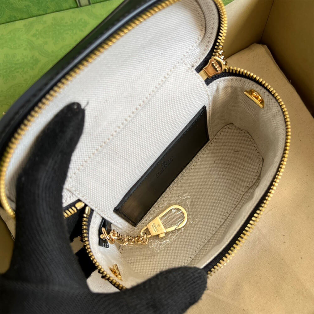 GG Matelass&eacute; top handle mini bag