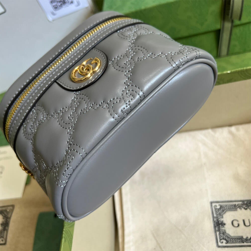 GG Matelass&eacute; top handle mini bag