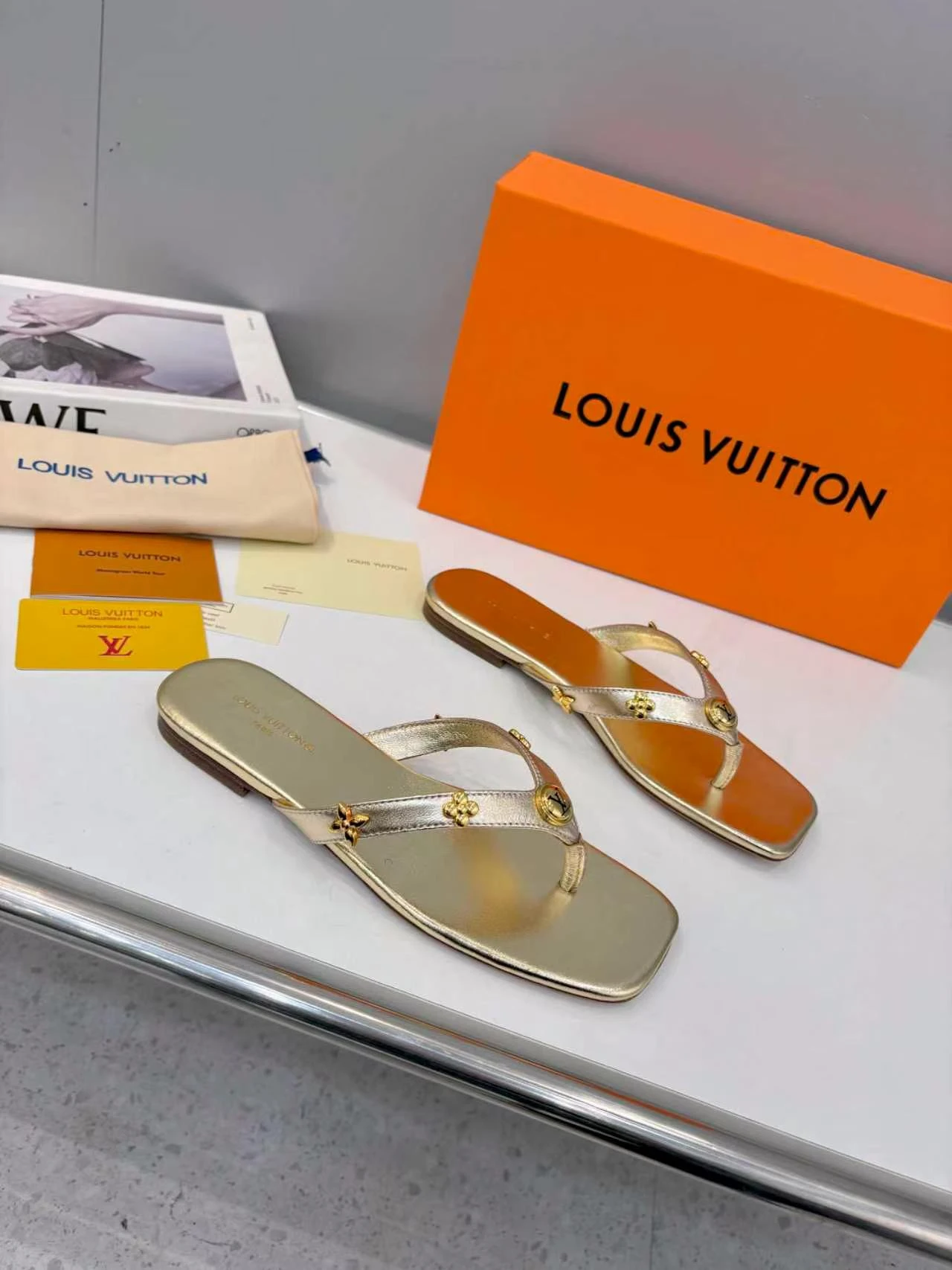 LV rivet flip flops