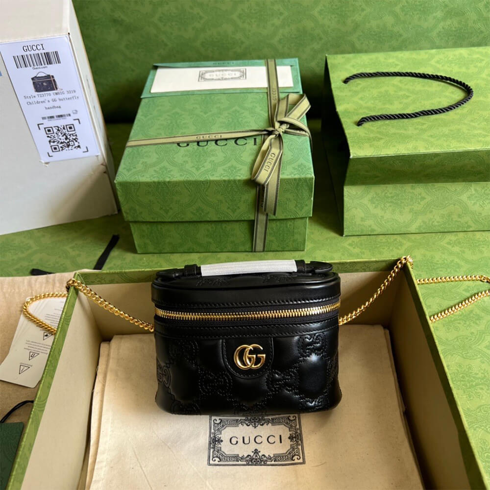 GG Matelass&eacute; top handle mini bag