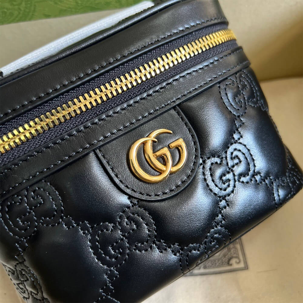 GG Matelass&eacute; top handle mini bag