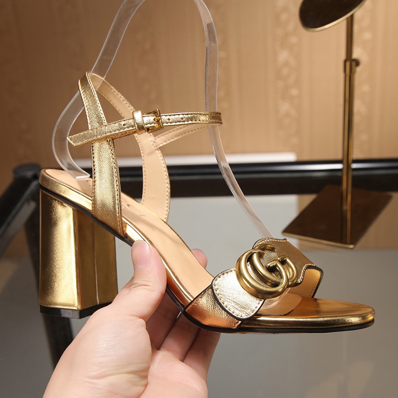 Gucci Bronze-colored buckle sandals