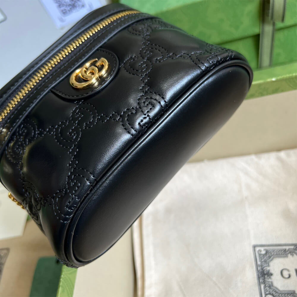 GG Matelass&eacute; top handle mini bag