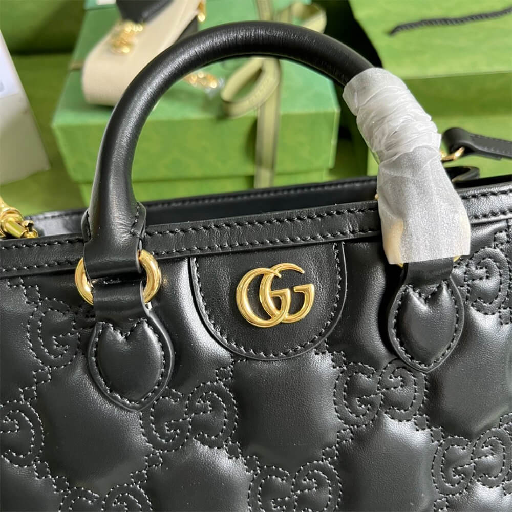 GG matelassé mini top handle bag
