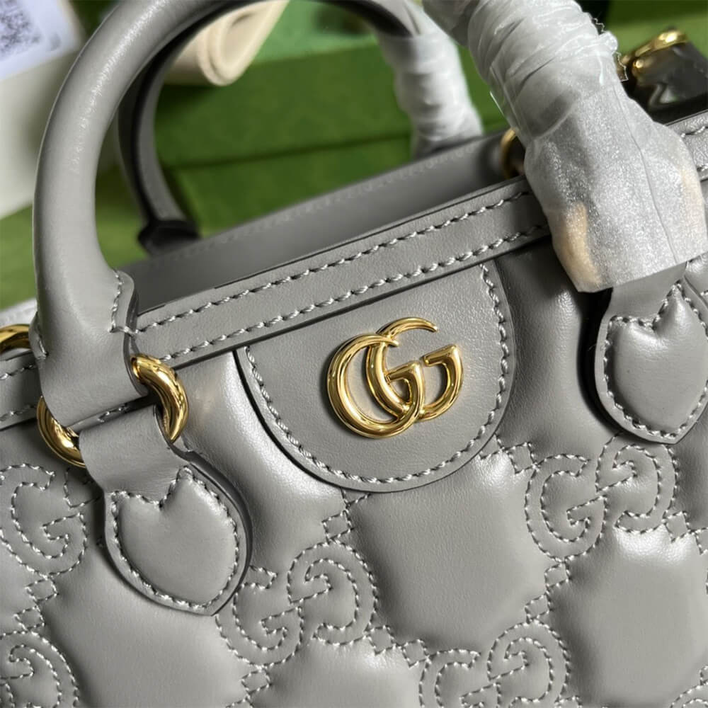 GG matelass&eacute; mini top handle bag