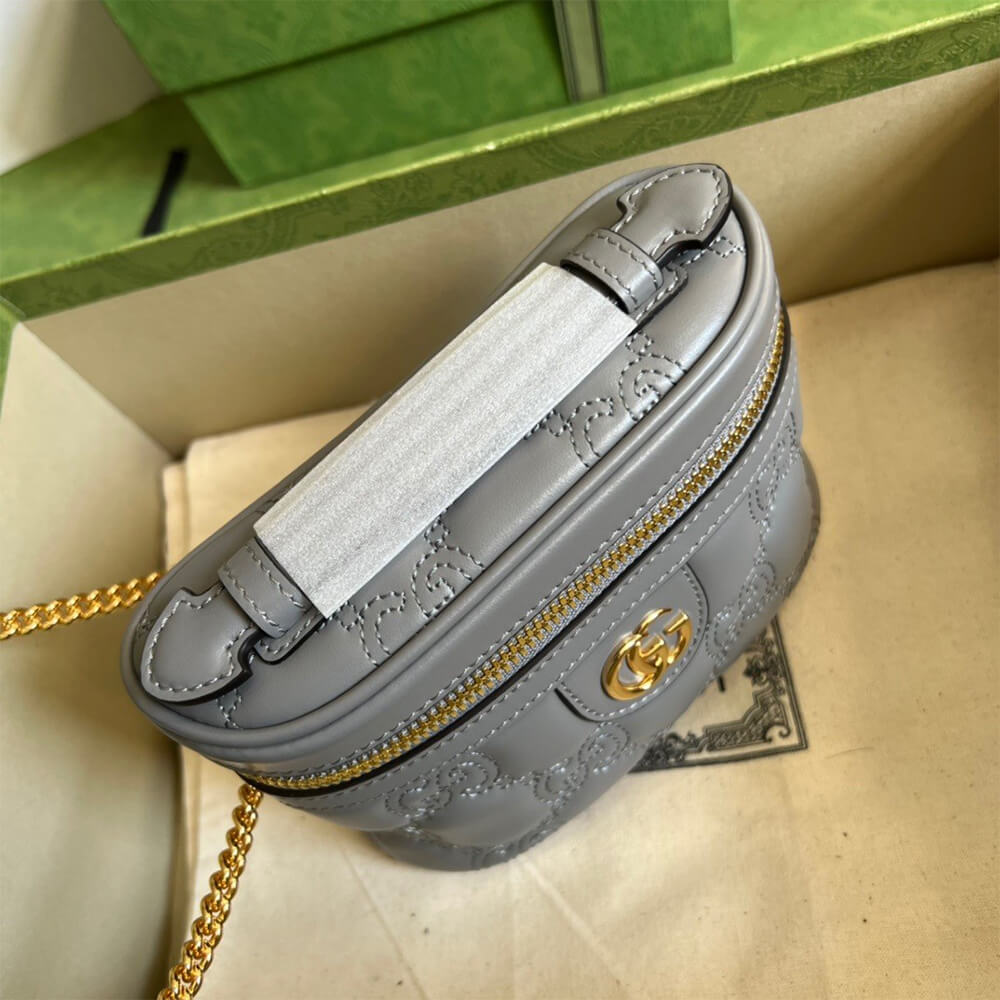 GG Matelass&eacute; top handle mini bag