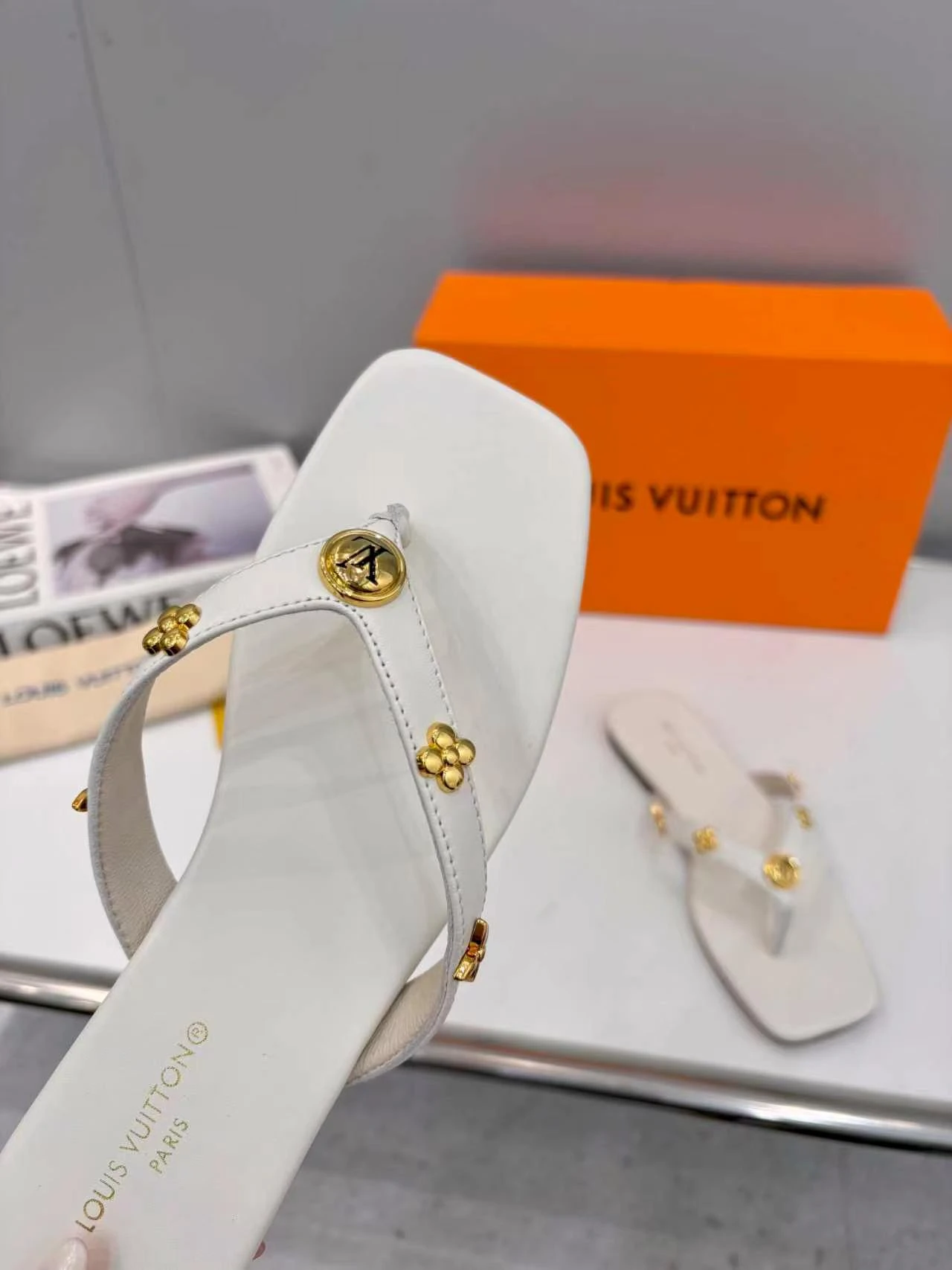 LV rivet flip flops