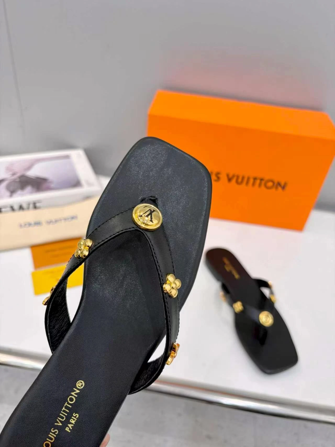 LV rivet flip flops