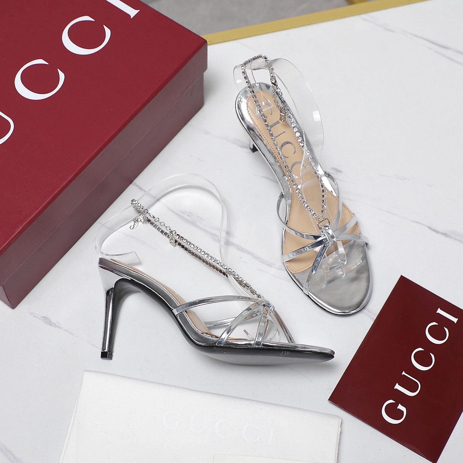 Gucci Stiletto heel sandals with crystal chain