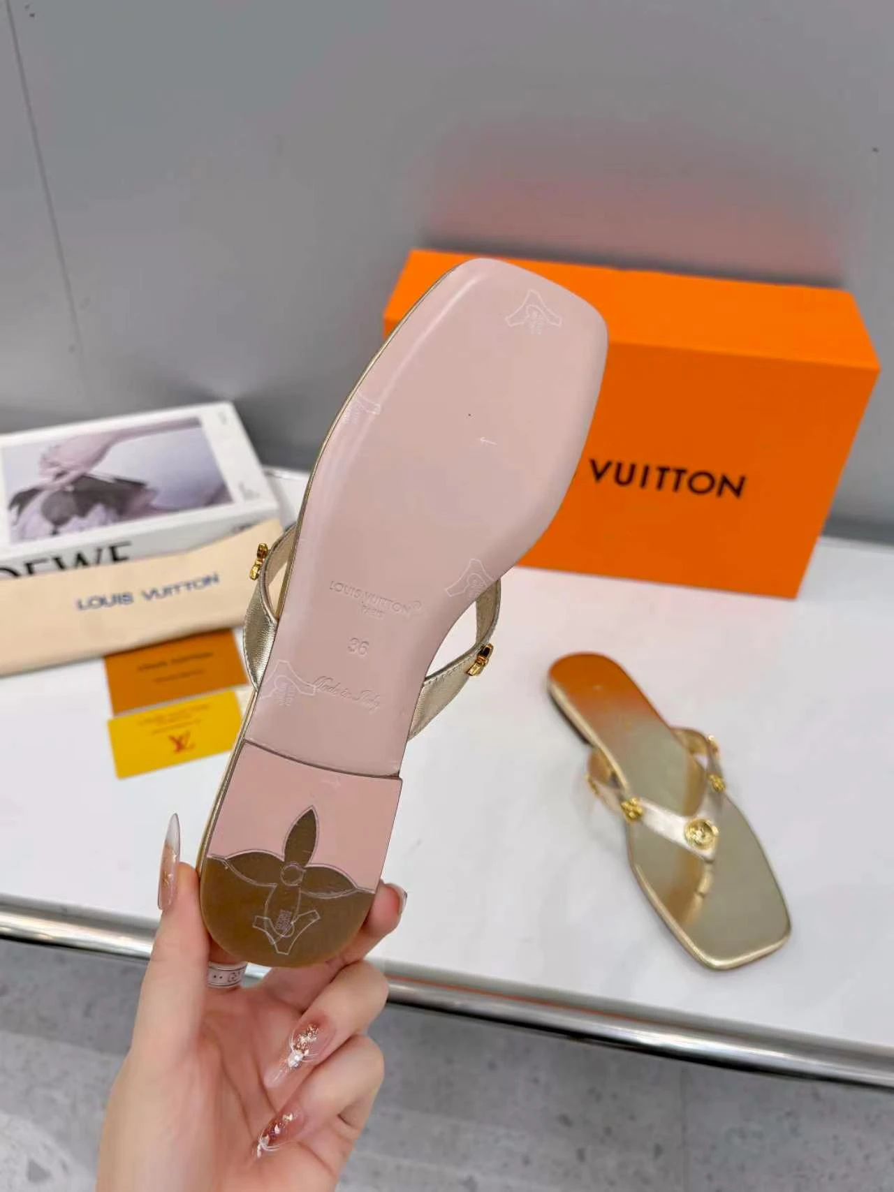 LV rivet flip flops