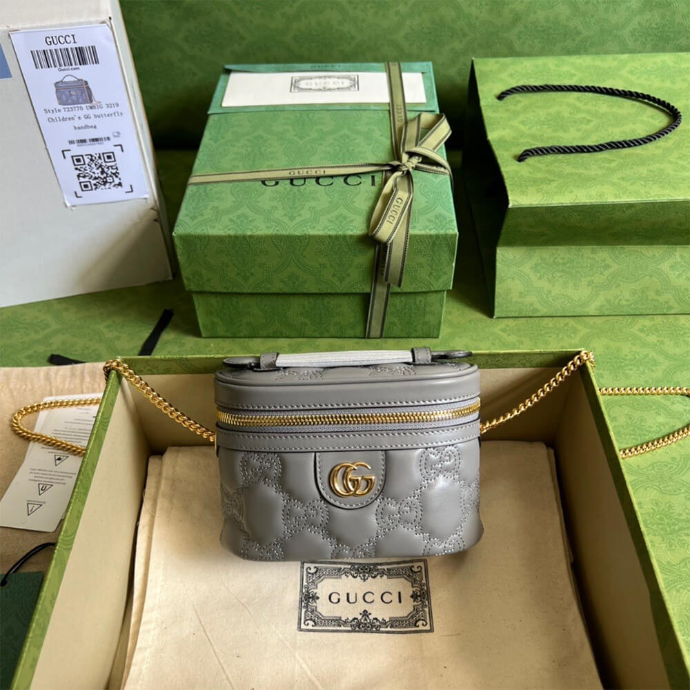 GG Matelass&eacute; top handle mini bag