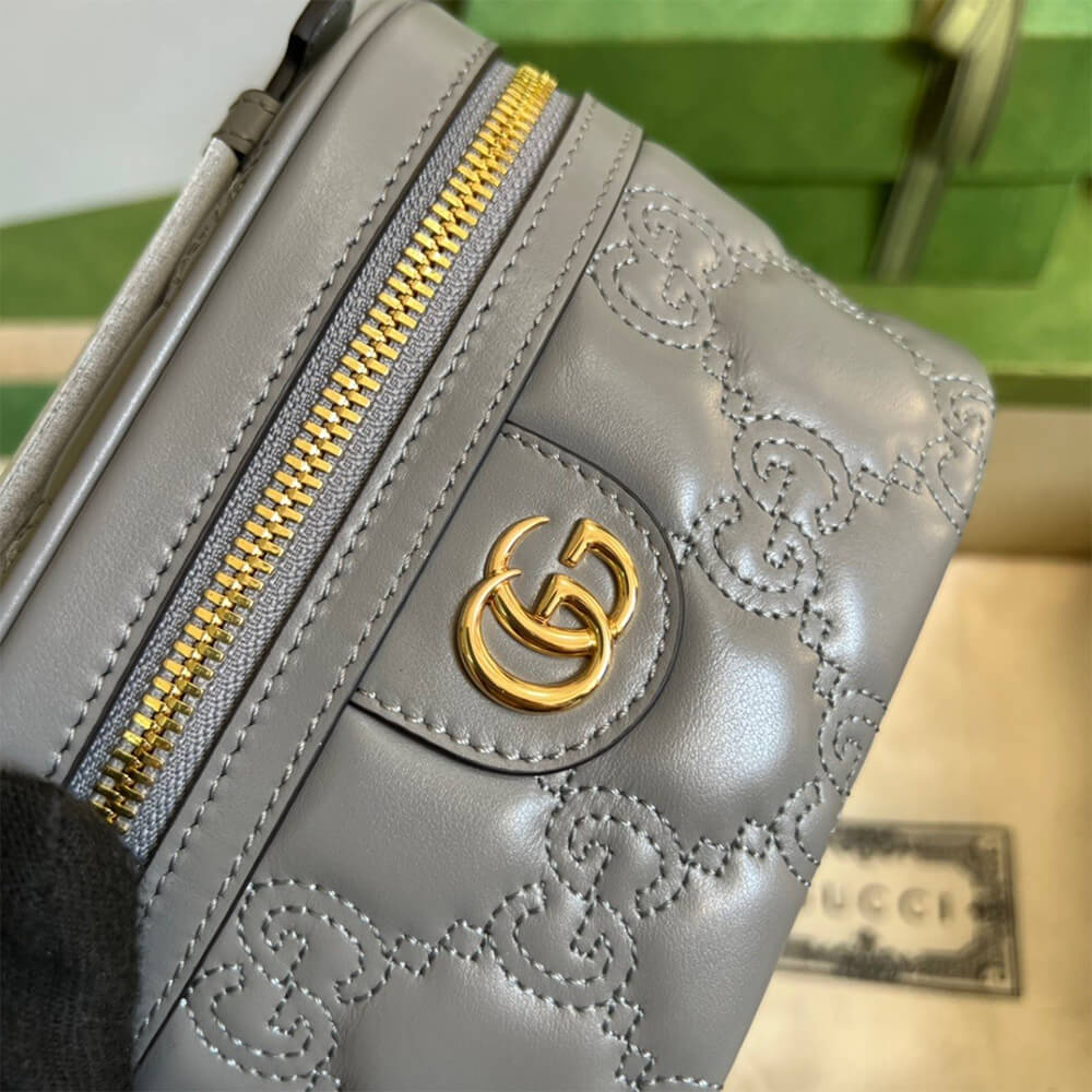 GG Matelass&eacute; top handle mini bag