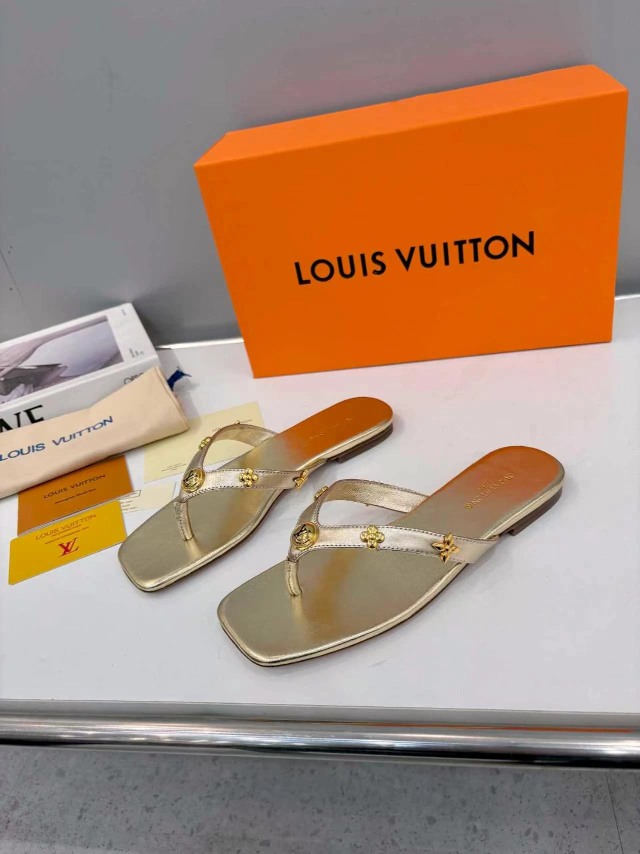 LV rivet flip flops