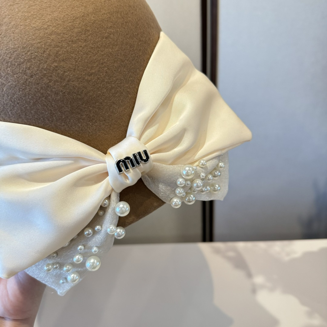 Miumiu Bucket Hat