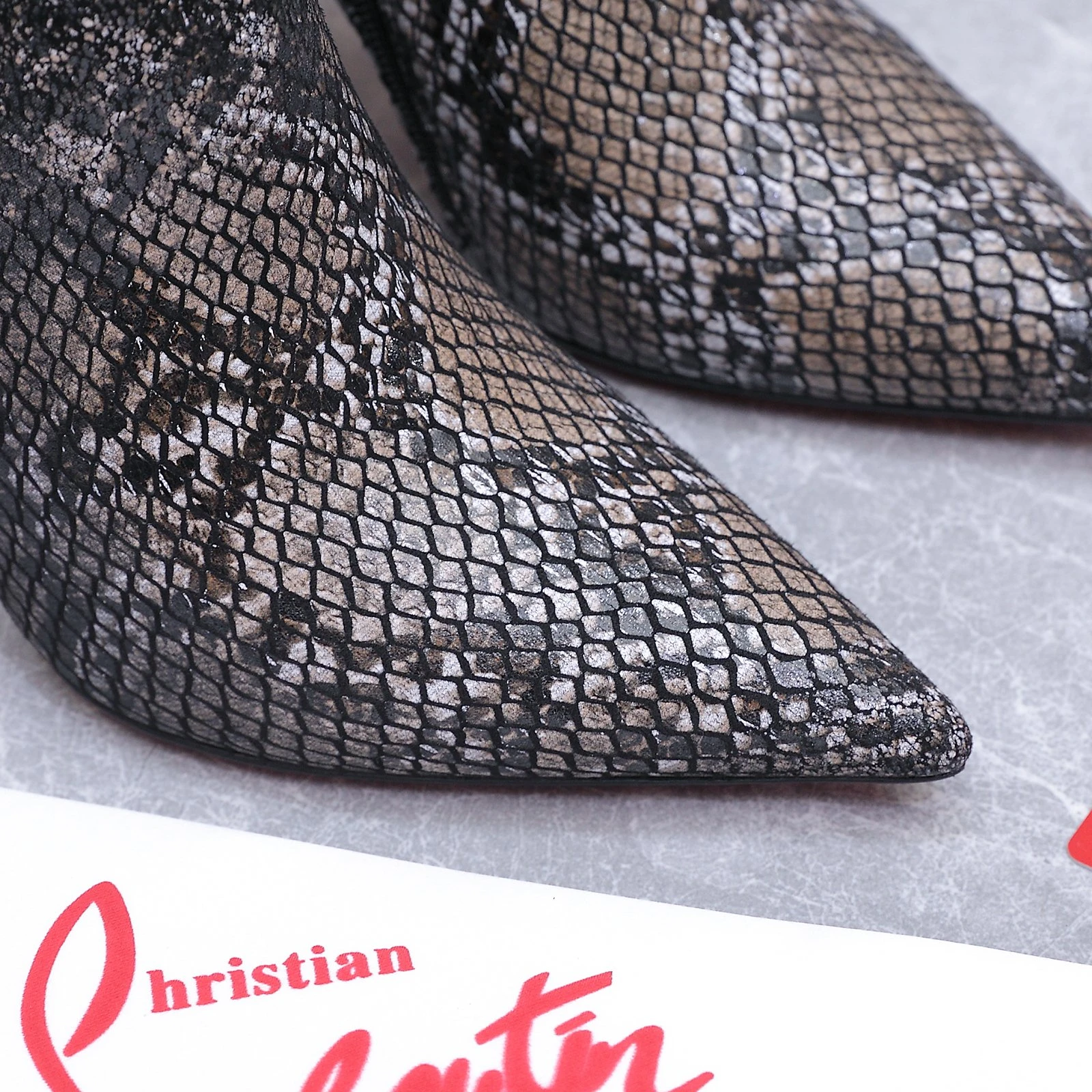 Christian Loubottin's High-Heeled Short Boots
