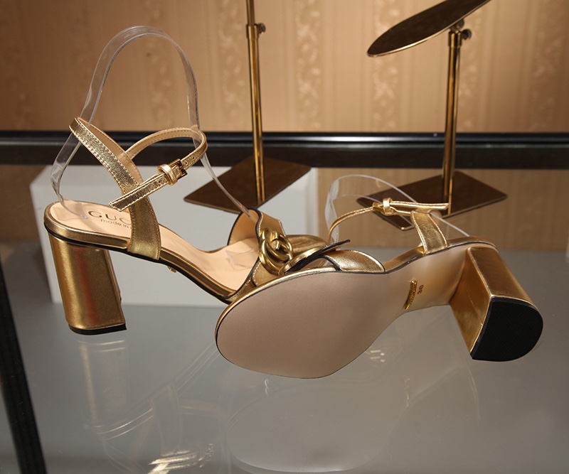 Gucci Bronze-colored buckle sandals