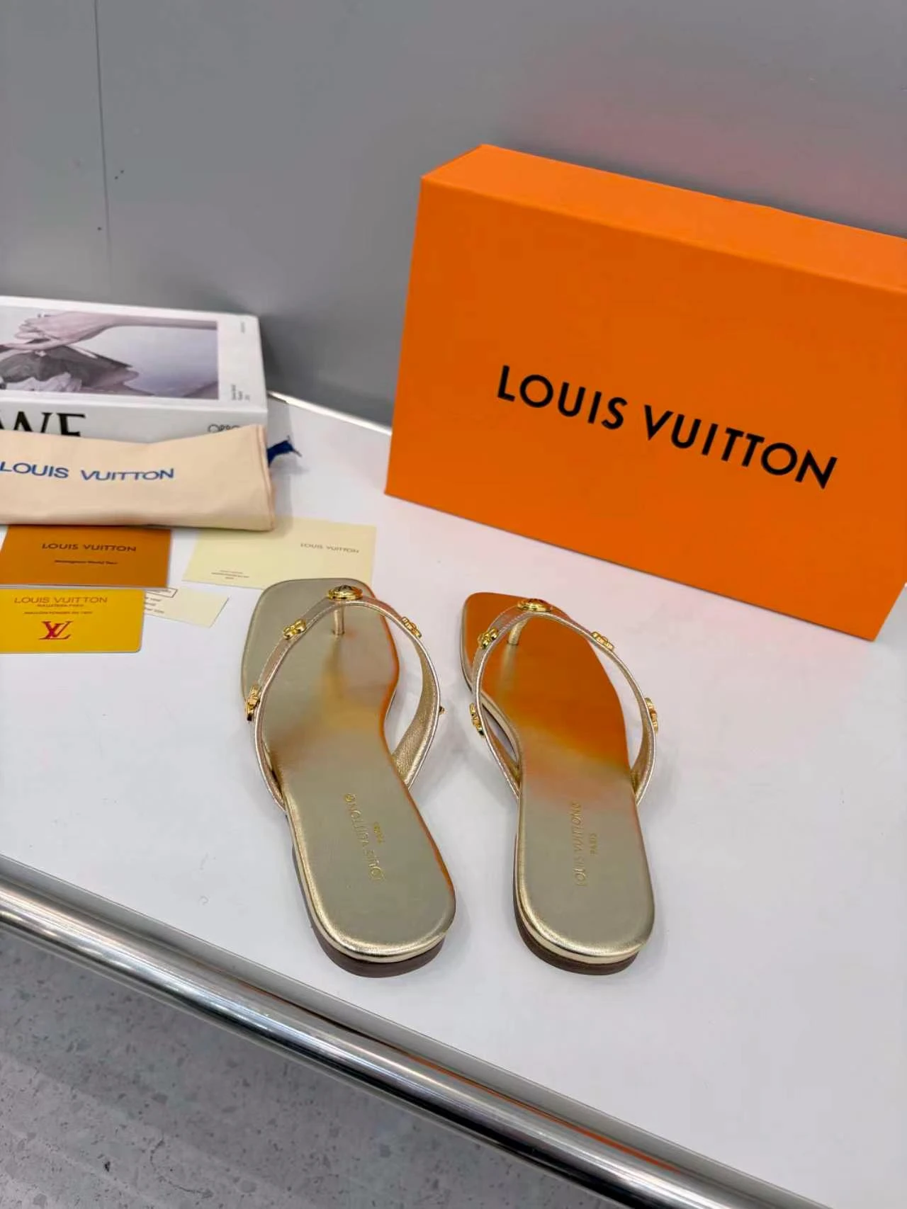 LV rivet flip flops