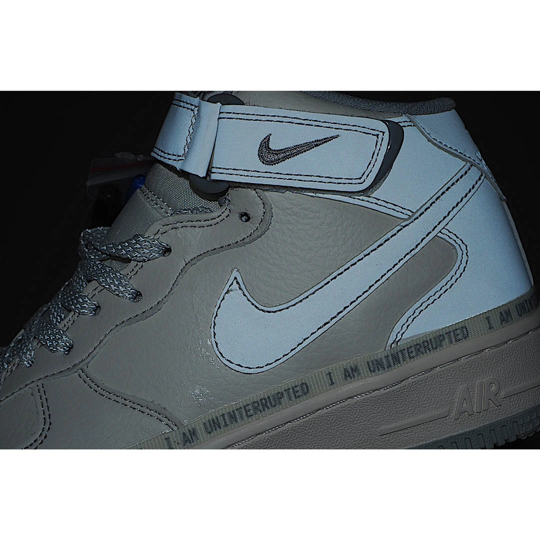 Uninterrupted Nike Air Force 1 Mid-Top Sneakers