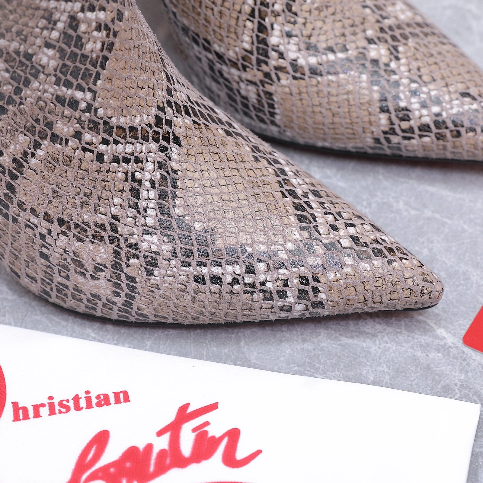 Christian Loubottin's High-Heeled Short Boots