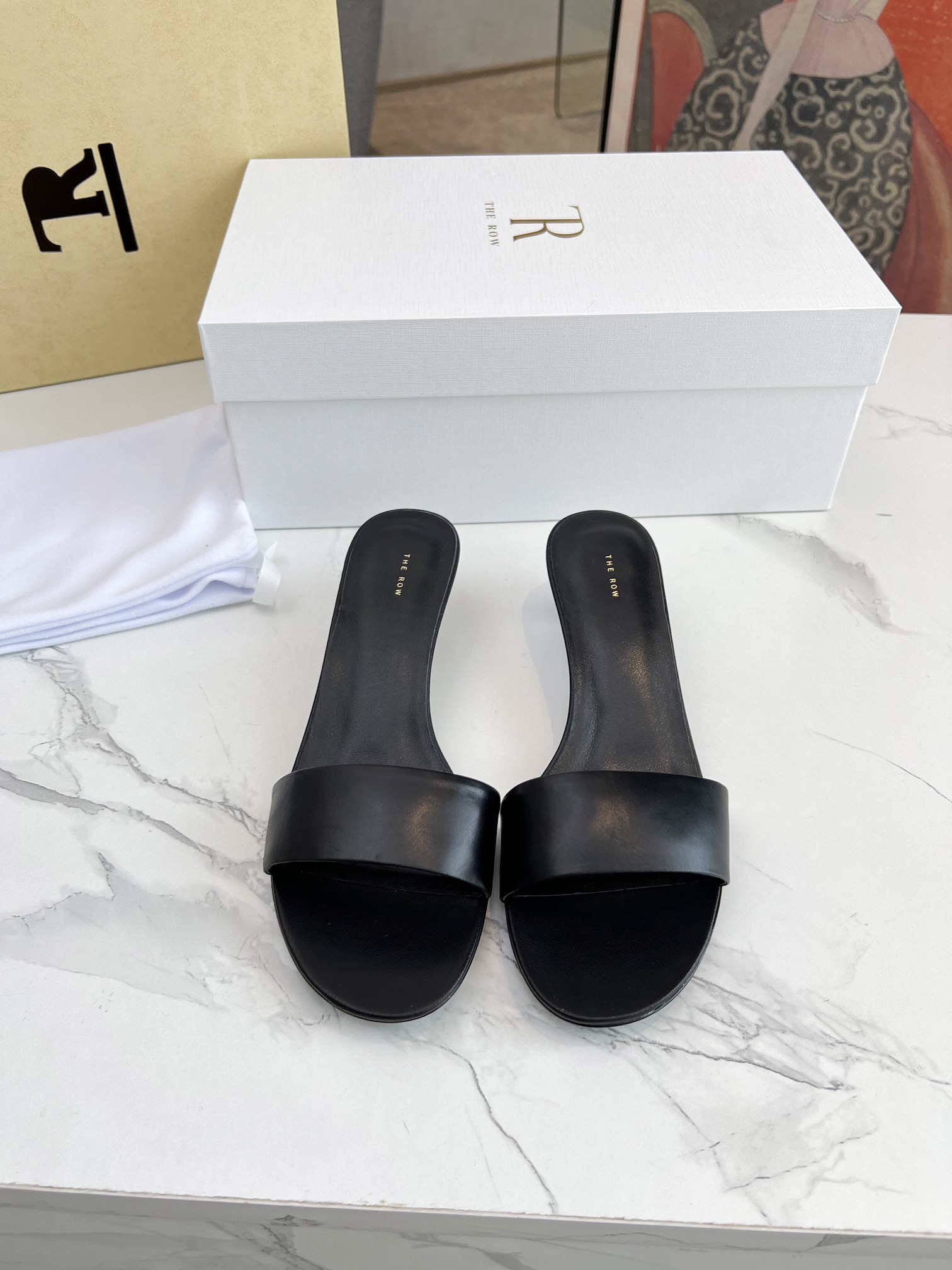 The row Slippers