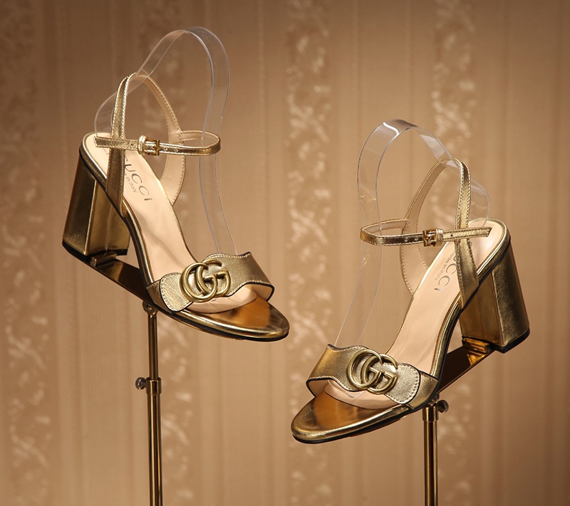 Gucci Bronze-colored buckle sandals