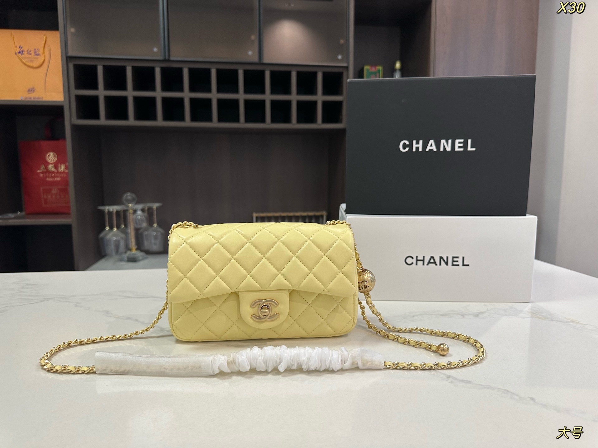 Chanel Classic Flap Bag with Gold Ball